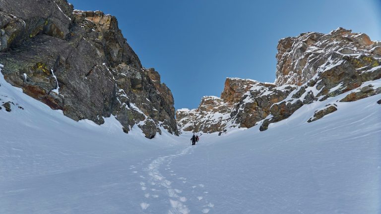 a group of people hiking in the snow on Vallée d'Aoste